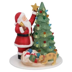 Weihnachtsmann beim Baum schmücken Outlet