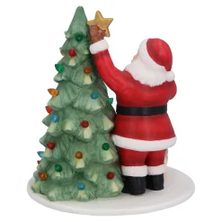 Weihnachtsmann beim Baum schmücken Outlet