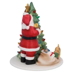 Weihnachtsmann beim Baum schmücken Outlet